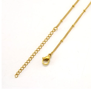 Close-up of 18K gold plated stainless steel chain with lobster clasp and extender