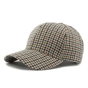 Classic brown houndstooth baseball cap in tweed fabric for women with curved brim