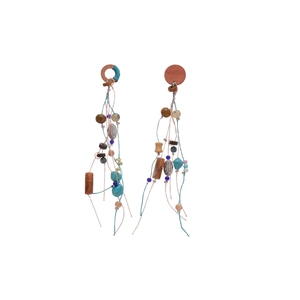 Bohemian silver needle drop earrings with turquoise stones and wooden beads on white backdrop