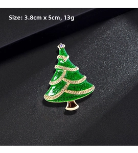 Detailed view of a 5cm green enamel Christmas tree brooch with sparkles and size markings