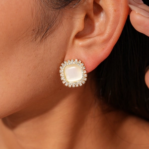 Detailed shot of square cat eye stone stud earring with crystal halo for women