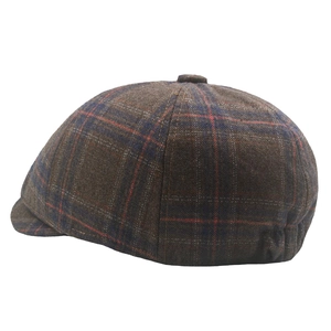 Classic British plaid wool newsboy cap in brown with red and blue checkered pattern