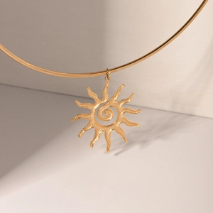 18k gold plated stainless steel choker with a large textured sunflower pendant on stone