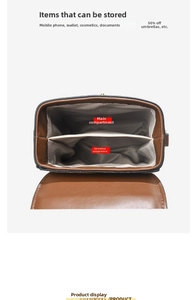 Vue intérieure du sac en cuir marron avec deux compartiments et doublure grise