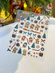 Detailed 3D embossed Christmas nail stickers featuring winter bears and festive trees