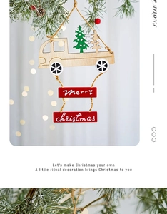Close-up of wooden Christmas car pendant hanging on pine branch with warm festive lights