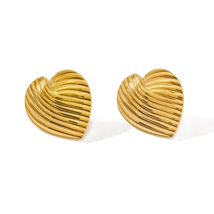 Polished gold stainless steel heart earrings with textured leaf pattern on white background
