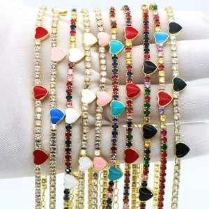 Close-up of colorful enamel heart zircon bracelets with gold plating and adjustable chain