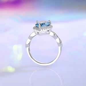 Elegant S925 sterling silver ring with oval blue sapphire gemstone and diamond halo