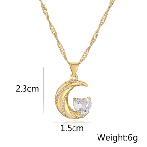 Detailed size specifications for gold crescent moon and heart pendant necklace, 2.3cm by 1.5cm