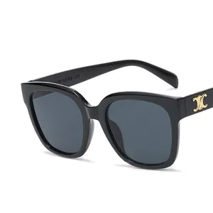 Vintage black square sunglasses with gold metal logo detail shown at a 45-degree angle