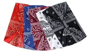 Detailed stack of paisley print yoga headbands in red blue burgundy white and black