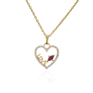 Gold MAMA heart pendant necklace with red gemstone and diamonds on white background