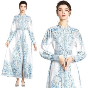 Women's paisley print maxi dress with stand collar, long sleeves and belted waist details