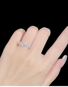 Detailed view of S925 sterling silver ring with rectangular and round zirconia inlay