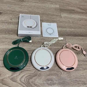 Detailed view of smart constant temperature cup warmers with USB cables and packaging