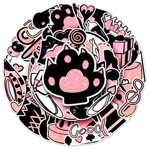 Detail of pink and black glitter party stickers featuring cat paws and cute hearts