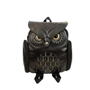 Creative owl shaped black PU leather backpack for women with white and gold stitching details