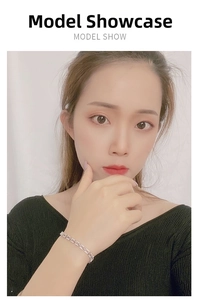 Elegant 925 sterling silver chain bracelet with shimmering zircon stones on wrist