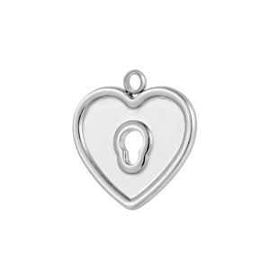 Detailed macro view of heart-shaped silver pendant with central keyhole design