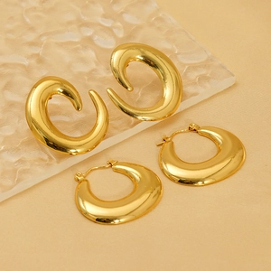 Irregular spiral and chunky gold hoop earring set in polished stainless steel