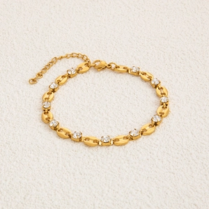 18K gold plated stainless steel evil eye bracelet with coffee bean links and zircons