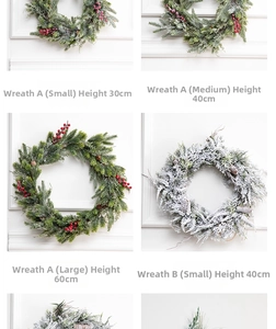 Close-up of red berry Christmas wreath with snow texture and varied size options