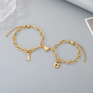 Golden stainless steel couple bracelets with heart magnetic clasp and lock key pendants