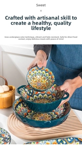 Detail of bohemian ceramic tableware with intricate blue and orange floral patterns