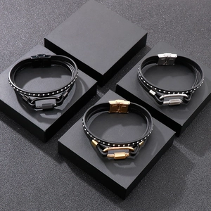 Detail of multi-layer leather bracelets with stainless steel buckles in black silver and gold