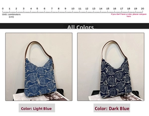 Detail of vintage denim tote bags with floral patterns in light and dark blue