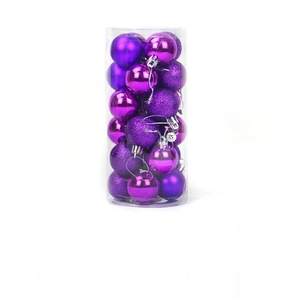 Set of purple Christmas ball ornaments in matte, shiny, and glitter finishes in a clear tube