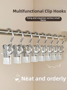 Detail view of 10-piece metal S-shaped hanging laundry clips with white non-slip rubber tips
