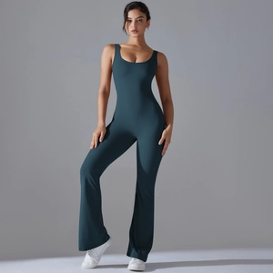 Dark teal sleeveless yoga jumpsuit with open back and flared leg fitness leggings