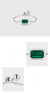 Detailed view of adjustable S925 silver chain ring with emerald cut green zircon