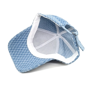 Light blue denim baseball cap with honeycomb texture and adjustable metal buckle strap