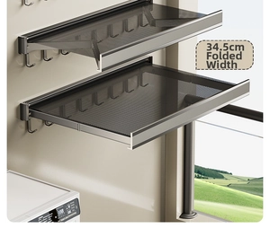 Detail of wall-mounted folding drying rack with mesh shelf and hooks, 34.5cm wide design