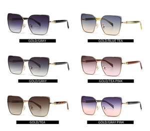 Detail of metal sunglasses with gradient lenses and marble patterned temple tips