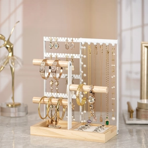 Three-tier wood and white metal jewelry stand for necklaces, earrings and bracelets