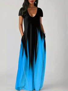 Detail view of the vertical blue ombre gradient and side pocket on this casual maxi dress