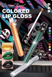 Detail of matte liquid lipsticks in gold and green with gothic skull patterns