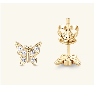 Detail of S925 silver butterfly earrings with gold plating and cubic zirconia