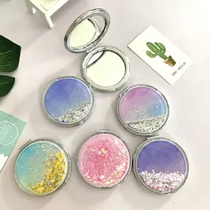 Folding round handheld makeup mirror with glittering quicksand and star sequins
