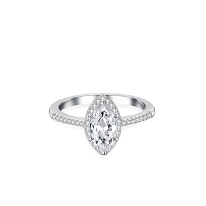 Macro detail of marquise-cut zircon ring with sparkling diamond pavé on silver band