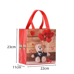 Waterproof non-woven teddy bear gift bag with handles and red heart balloon patterns