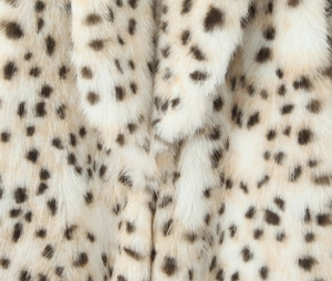 Macro shot of faux leopard fur texture with dense fibers and realistic animal spots