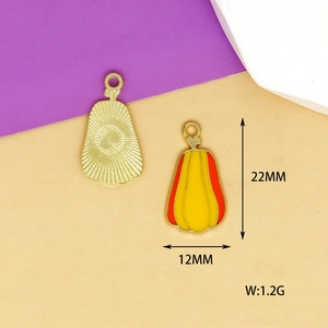 Detail of enamel pumpkin charm with dimensions 22x12mm and 1.2g weight measurement