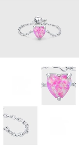 Detailed view of S925 sterling silver heart opal ring featuring adjustable chain and prong setting