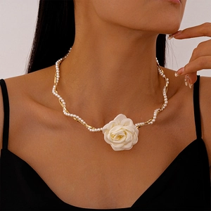 Elegant gold chain and pearl necklace featuring a 3D white fabric camellia flower charm