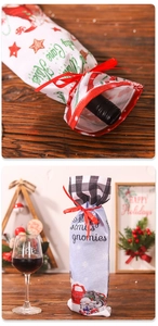 Detail of Christmas wine bottle cover with plaid pattern and festive gnome illustrations